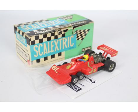 Scalextric Exin (Spain) - A boxed Scalextric Exin #4054 Tyrell F1 P34. The model in red appears to be in Good overall conditi