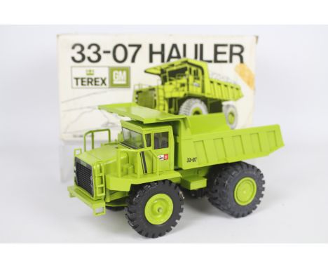 NZG - A boxed GM Terex 33-07 Hauler in 1:40 scale. # 163. The model appears Near Mint with only a few marks on some raised ed