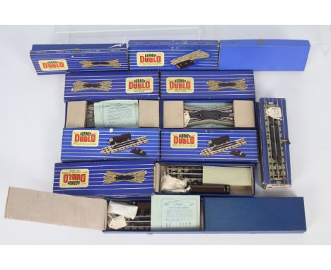 Hornby Dublo - 11 x boxed 3 rail track sections including # EUBR Electronically Operated Uncoupling Rails x 3, # EDCL Diamond