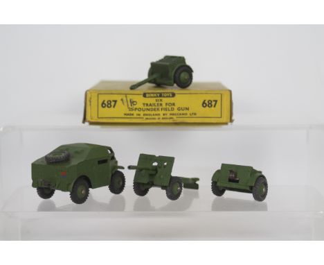 Dinky - An unboxed Dinky # 697 25-Pounder Field Gun set with Artillery Tractor, Trailer and Gun. The models appear Near Mint 