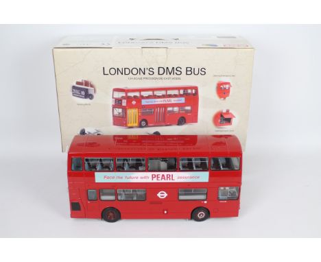 Gilbow - A boxed 1:24 scale Daimler DMS London Transport Bus # 99101. This bus covers Finchley Garage Routes; 221 North and 2