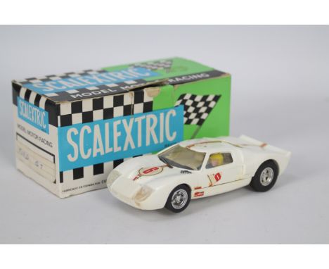 Scalextric Exin (Spain) - A boxed Scalextric Exin #C35 Ford GT. The model in white appears to be in Good overall condition wi