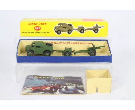 Dinky - A boxed Dinky # 697 25-Pounder Field Gun Set. This is unsold stock from a long closed shop and has been in storage fo