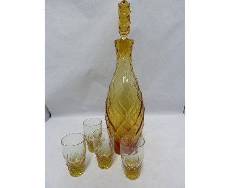 Moser - a dichroic diamond cut decanter and stopper, light change from amber to cherry red; and four small shot glasses, ligh