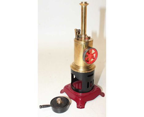 Bing later restored vertical steam engine, comprising of boiler, single oscillating cylinder with opposed fly wheel, repainte