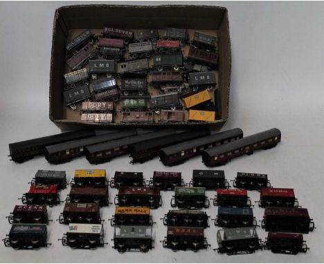 One box containing a quantity of mixed make rolling stock, examples to include four Trix H0 scale maroon BR Mk1 coaches, Grah