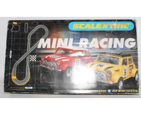 Scalextric Mini Racing set, has been open but seems in good order with 2 Minis inside plus track etc. (unchecked) (VG)(BVG)