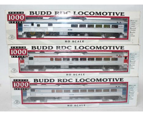 A Proto 1000 series H0 scale Budd RDC locomotive group to include a CP Rail 9100 Dayliner loco together with a BC Rail BC23 l