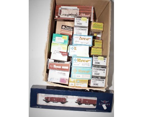 One box containing a quantity of various boxed H0 scale continental rolling stock and accessories to include Lima, Jouef, Fle