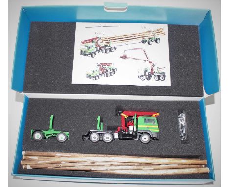 A Conrad model No. 71179/0 Man TGS 3 axle 6x4 tractor unit with crane and dolly trailer, finished in green and yellow with Sc