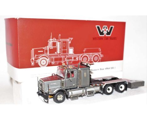 A WSI Models No. 04-1041 Western Star 1/50 scale model of a 4964 SX-1 heavy haulage tractor unit housed in the original Weste