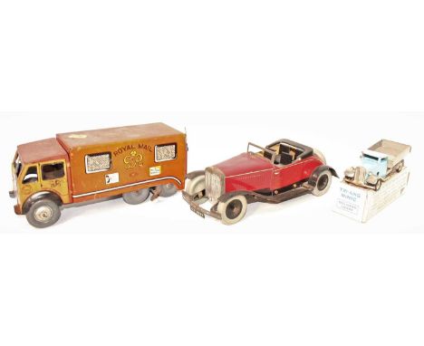 A collection of tinplate mixed commercial and saloons to include a Mettoy No. 15546 Royal Mail clockwork and tinplate deliver