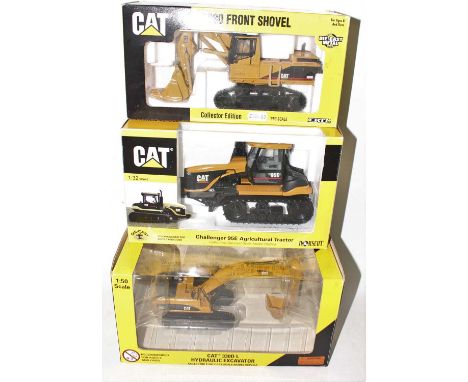 A Norscot and ERTL 1/50 scale Caterpillar diecast group to include an ERTL Caterpillar 5080 front shovel, a Norscot Challenge