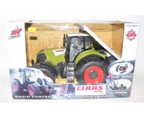 Zap Toys Radio Controlled model of a Claas Axion 850 tractor with control unit housed in the original window box