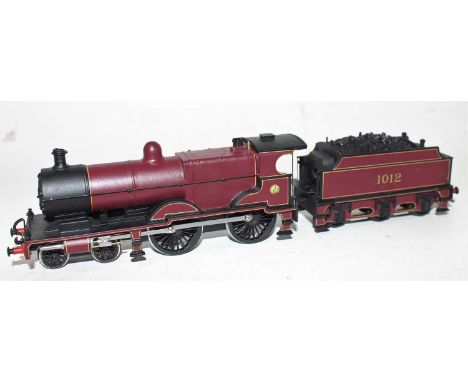 A very well constructed and finished 00 gauge white metal and brass model of a Johnson Midland Railway Compound 4P 4-4-0 loco