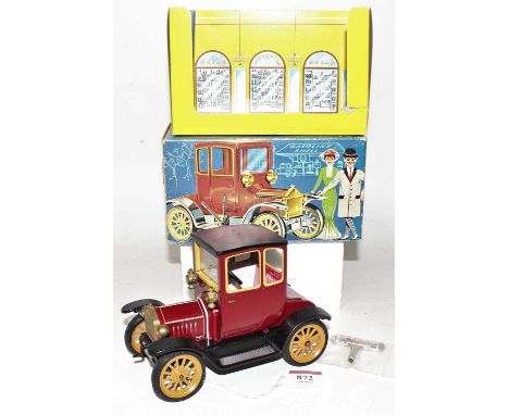 A Schuco No. 1227 Old Timer Ford Coupe 1917 saloon, tinplate example in the original box