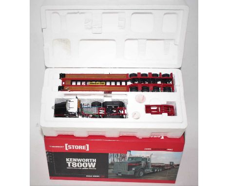 A Sword Precision Models model No. 410010 1/50 scale boxed diecast model of a Mammoet Kenworth T800 W tractor unit with four 