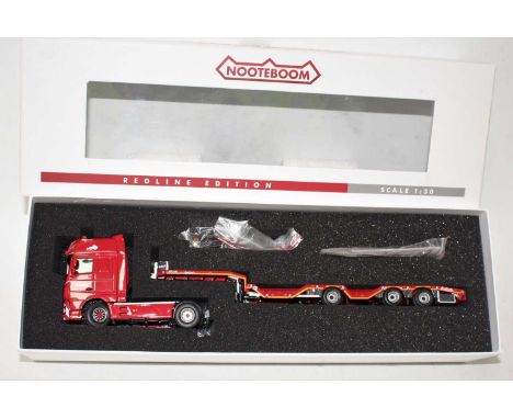 An IMC Models model No. 5322508, 1/50 scale boxed model of a DAF SSC Euro 6 4x2 tractor unit, together with a Nooteboom low l