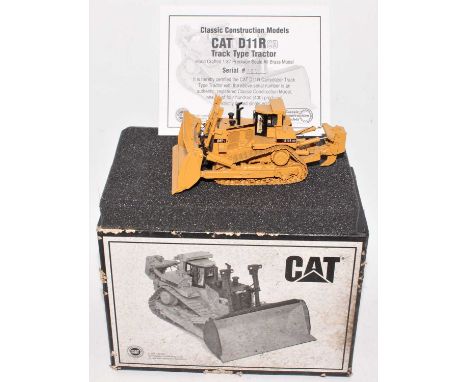 A Classic Construction Models (CCM) 1/87 scale precision all brass model of a Caterpillar D11R track type tractor housed in t