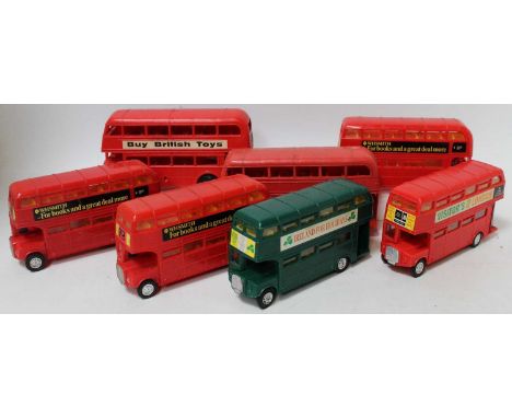 A collection of seven various plastic friction drive and battery operated public transport buses to include a Made in Hong Ko