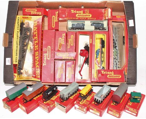 Tray containing Triang goods wagons: R562 Catapult launch car, appears unwrapped but with a tear in the cellophane wrapper (M