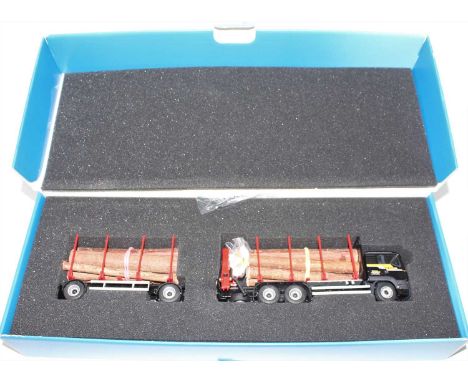 A Conrad model No. 75183/0 1/50 scale boxed model of a Neuhauser Man TGS tractor unit and dolly trailer, timber transport exa