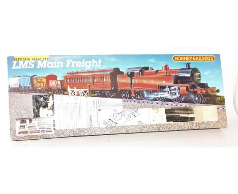 A Hornby 00 gauge model No. R661 LMS Main Freight gift set, appears unused, and housed in the original plastic packed pictori