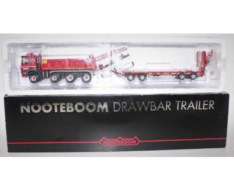 A WSI Collectables model No. 02-1111 boxed Nooteboom KNT Ginaf 8x4 tractor unit, with drawbar trailer, housed in the original