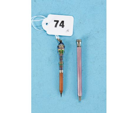 A CONTINENTAL WHITE METAL AND ENAMEL EGYPTIAN REVIVAL PENCIL  HOLDER, stamped 800 and a Swiss silver and lilac enamel PROPELL