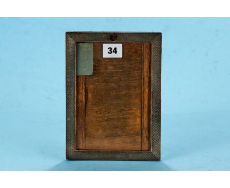 A GEORGE V RECTANGULAR SILVER ENGINE TURNED PHOTOGRAPH FRAME oak backed (lacks strut), maker: PJF, Birmingham 1923.   