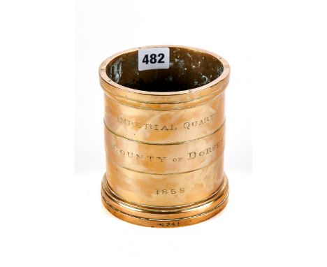 A MID 19TH CENTURY CIRCULAR BRONZE IMPERIAL QUART MEASURE inscribed "COUNTY OF DORSET, 1858, NO 1241, VR stamp to rim, 5 1/4 