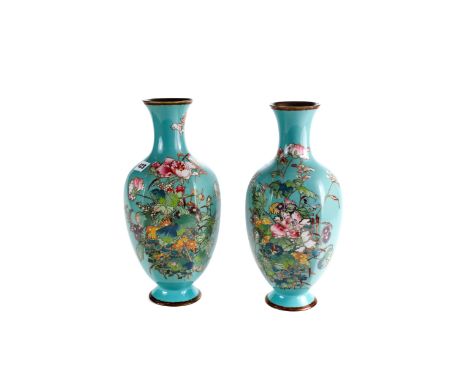 A PAIR OF LATE 19TH/EARLY 20TH CENTURY ORIENTAL CLOISONNE ENAMEL VASES of hexagonal form, green ground with floral decoration