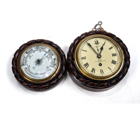 DENT, ROYAL EXCHANGE, LONDON, AN EARLY 20TH CENTURY SHIPS CLOCK, painted dial with subsidiary seconds, in an oak rope twist c