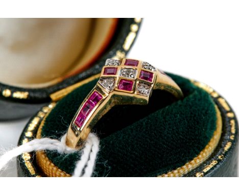 A 9CT YELLOW ART DECO INFLUENCE RUBY AND DIAMOND RING, with ruby set shoulders, size P, approximately 2.4 grams.   