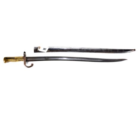 A 19TH CENTURY FRENCH BAYONET with ribbed brass hilt and hooked quillon, single edge fullered blade, 20 1/2 ins, marked Julle