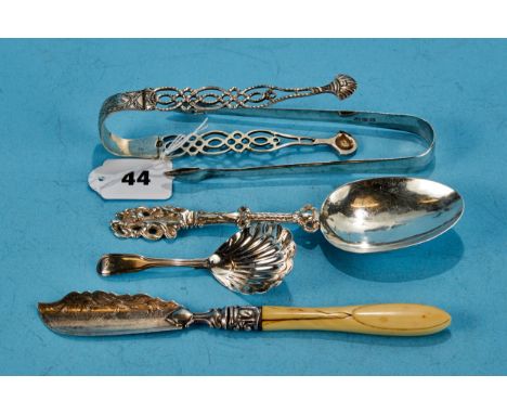 A PAIR OF GEORGIAN PLAIN SILVER SUGAR TONGS, maker: SG. EW. IB, London 1811, a pair of pierced silver DITTOS (repaired), a Ge