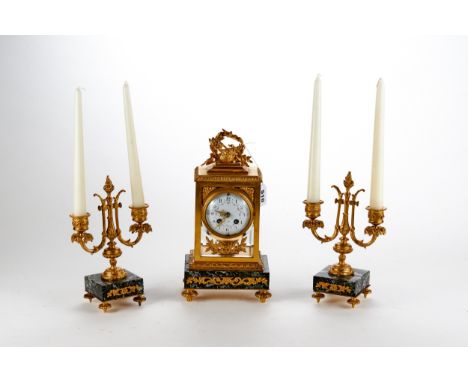 A.D. MOUGIN, FRANCE, A LATE 19TH/EARLY 20TH CENTURY GILT METAL AND MARBLE CLOCK GARNITURE, circular enamel dial with twin tra