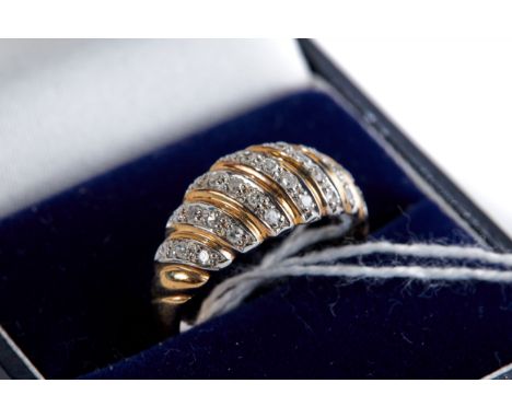 A 9CT YELLOW GOLD RING set with thirty diamonds, size R, approximately 3.2 grams.   