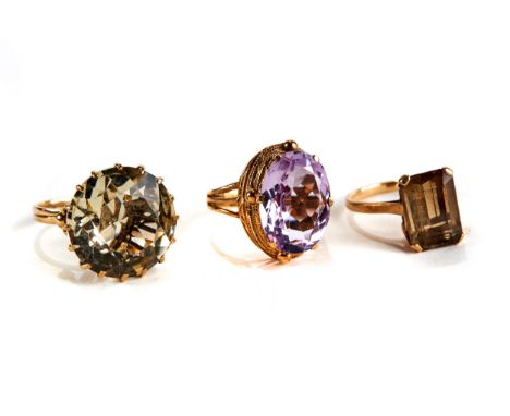 A 9CT GOLD AMETHYST SET DRESS RING and two 9ct gold stone set DITTOS, sizes O, P and R, approximately 19.3 grams all in.   