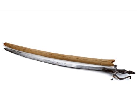 A 19TH CENTURY INDIAN "TULWAR" SWORD of typical form with steel hilt, blade length 31 ins, wooden scabbard with later canvas 