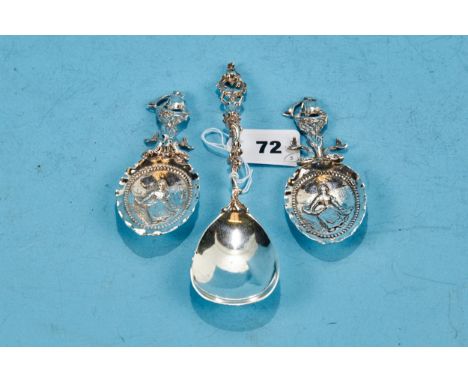 A 19TH CENTURY CONTINENTAL SILVER SPOON with figure form handle and pear shaped bowl, import mark for London 1893 and a pair 