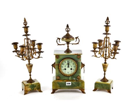 MOUGIN, FRANCE, A LATE 19TH CENTURY GREEN ONYX CLOCK GARNITURE, circular floral decorated dial, twin train movement, the case