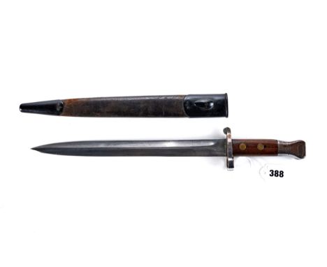 A 19TH CENTURY BRITISH LEE ENFIELD MK1 BAYONET, stamped Wilkinson London, double edge blade, 12 ins with leather scabbard.   