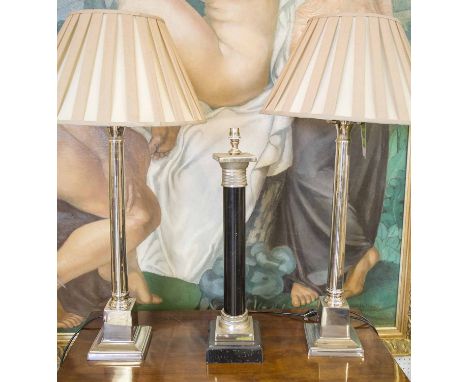 LAMPS, a pair, classical style, column chrome lamps with shades and another black column lamp, 62cm H. (3)