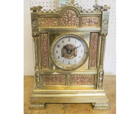 MANTLE CLOCK, an early 20th century brass and copper Arts and Crafts style clock, 40cm H x 31cm W x 18cm D. (with faults)