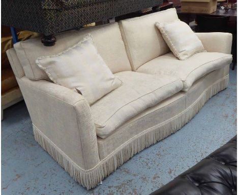 SOFA, two seater, in beige fabric with bullion fringe on turned supports, 223cm L.