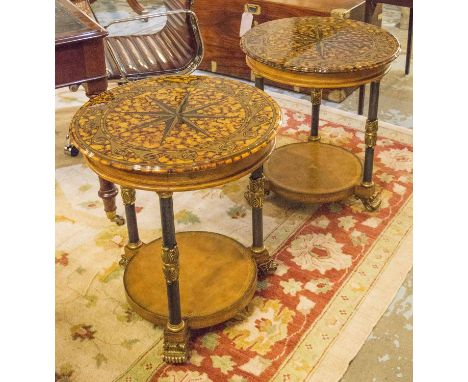 LAMP TABLES BY MAITLAND SMITH, a pair, circular gilt tooled leather clad with ebonised gilt metal mounted columns and compass