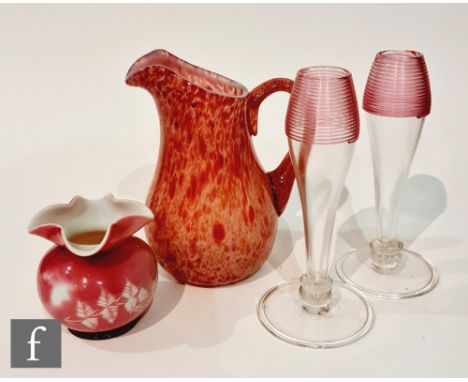 A collection of late 19th Century glass, to include a Stourbridge jug of ovoid form with applied handle and ruby mottled deco