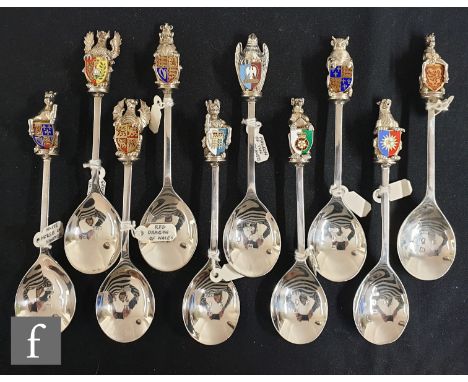 A set of ten 20th Century Queen's Unique Beasts silver spoons, with assorted finials depicting cast heraldic beasts holding e