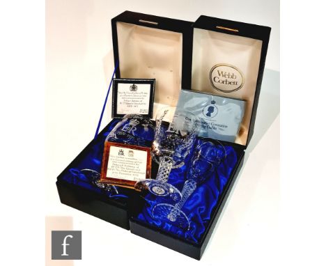 A collection of later 20th Century commemorative drinking glasses with air twist stems, comprising a Webb Corbett Queen Eliza